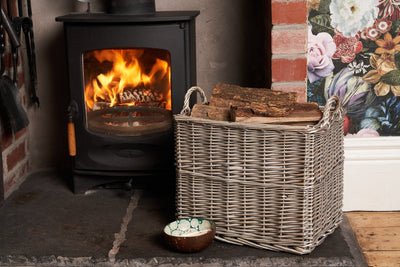 Rectangular Log Basket filling with fire wood in front of a fire